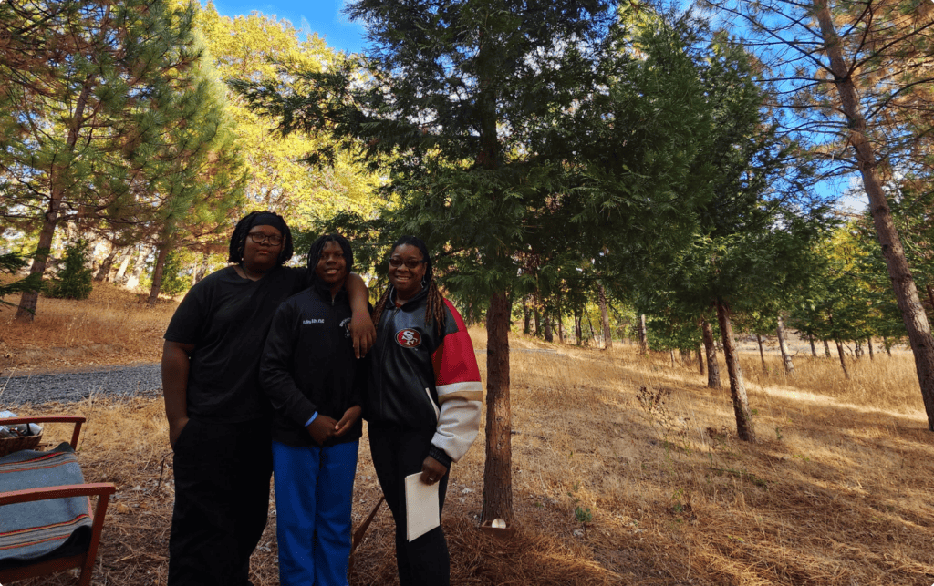 The Jones family having a forest memorial for their loved one in Better Place Forests Yosemite Gateway memorial forest.